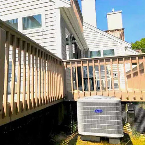 A Robies installed AC unit outside a house